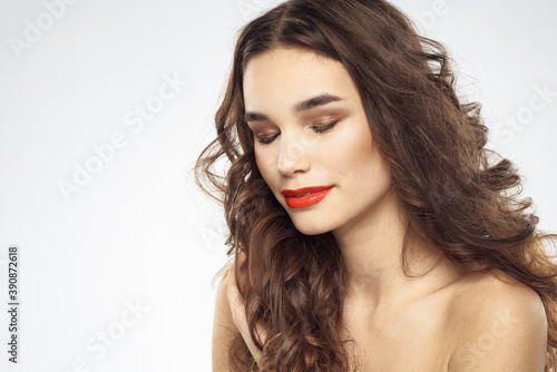 Elegant woman with bare shoulders red lips glamor attractive look cropped look
