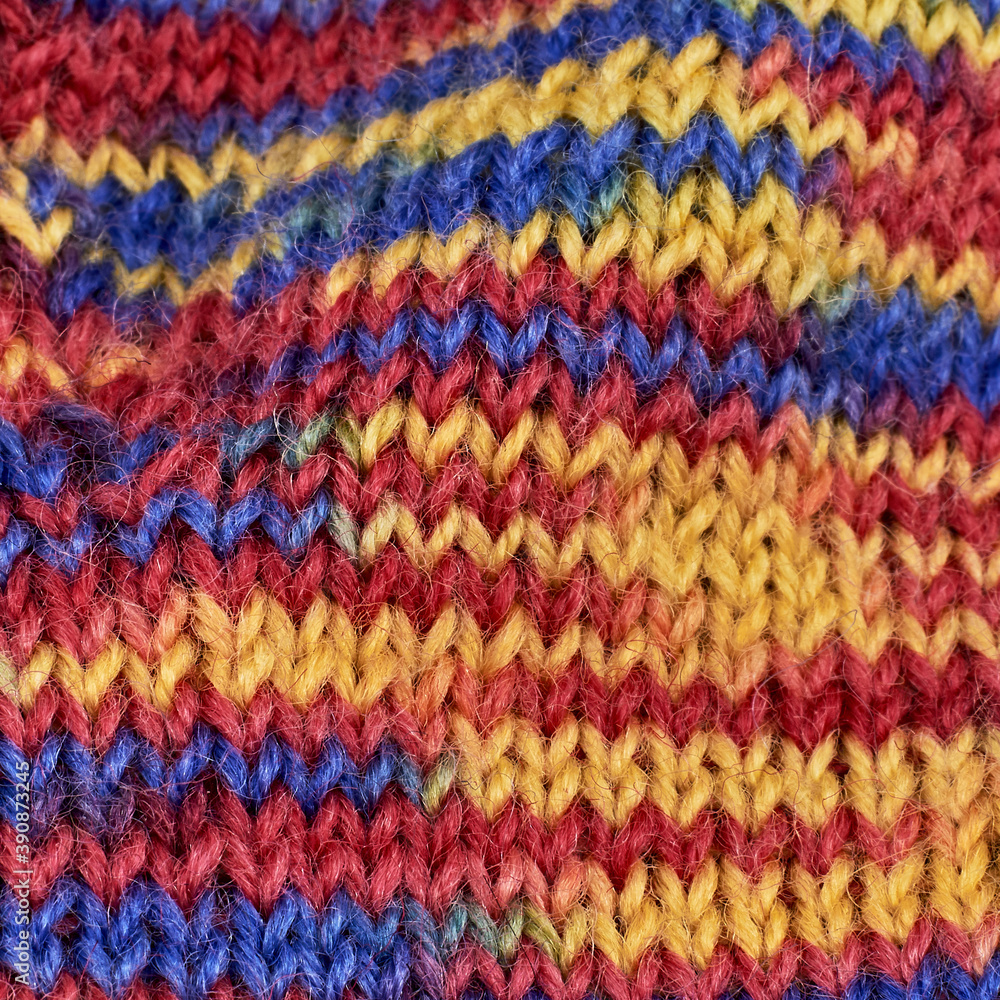 motley multicolor wool knitted warm handmade sock as a gift for the new year
