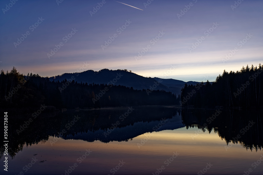 Fototapeta premium sunset over the lake