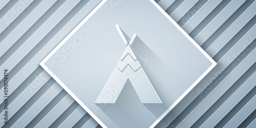 Paper cut Traditional indian teepee or wigwam icon isolated on grey background. Indian tent. Paper art style. Vector.