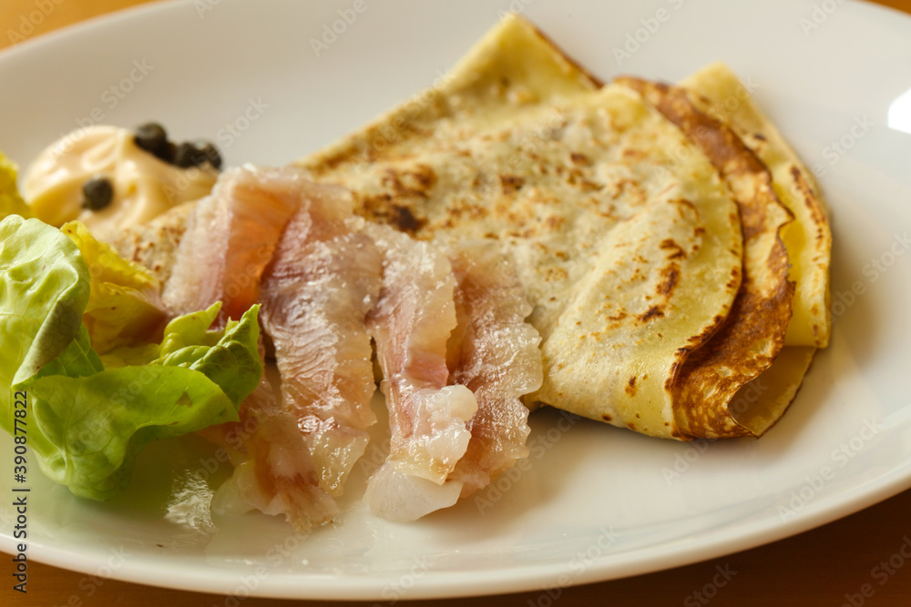 Gravlax with pancake served salad Gravlax with pancake served salad