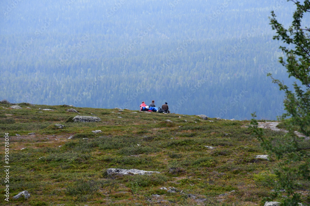 Fototapeta premium hikers rest on the hill