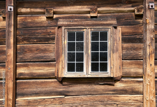 Window on an old, retro wooden house in Norway