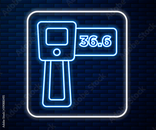 Glowing neon line Digital contactless thermometer with infrared light icon isolated on brick wall background. Vector.