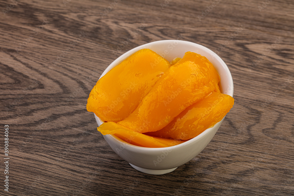 Sweet mango slices in syrop Sweet mango slices in syrop