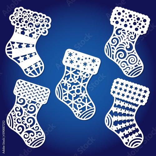 Laser cutting kit. Christmas openwork socks. Vector