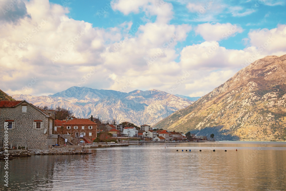 Beautiful winter Mediterranean landscape. Small town of Prcanj on coast of Kotor Bay.  Montenegro, Adriatic Sea