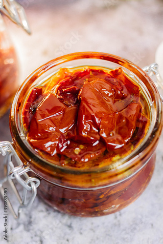 sun-dried tomatoes with olive oil in a jar