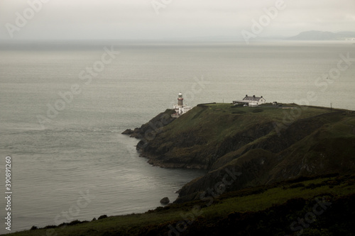 Photography Vertical shot of Baily Lighthouse in Dublin Ireland on a gloomy day
