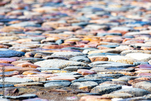 Springtime. Stone pavement covered with water