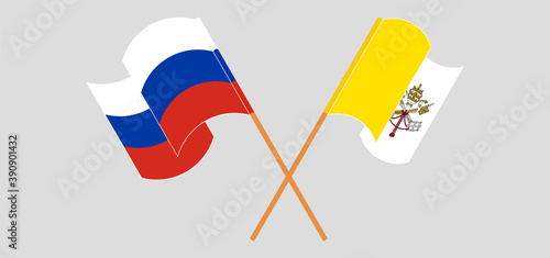 Crossed and waving flags of Vatican and Russia