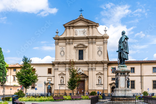 Neoclassical-style façade of the Dominican basilica of San Marco, in St Mark square with general Manfredo Fanti's statue, in Florence city center, Tuscany, Italy photo
