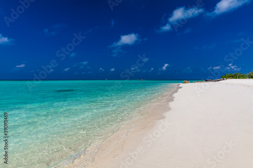 White sandy beach in Maldives with amazing blue lagoon