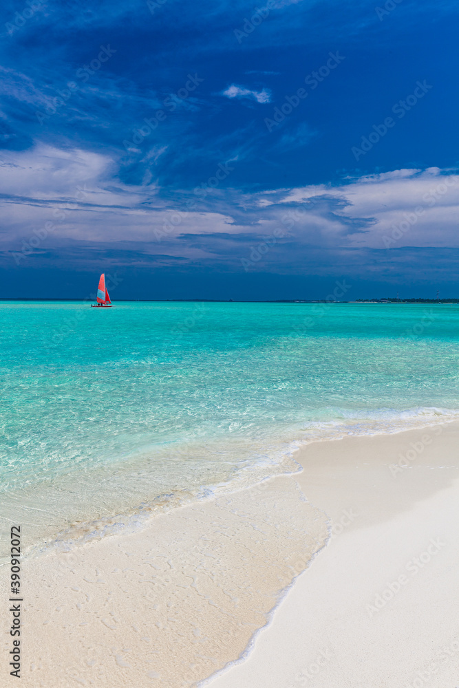 White sandy beach in Maldives with amazing blue lagoon