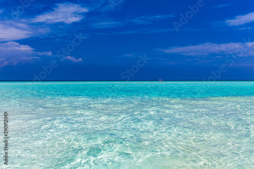 White sandy beach in Maldives with amazing blue lagoon