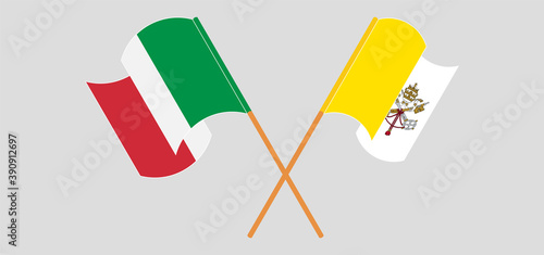 Crossed and waving flags of Vatican and Italy