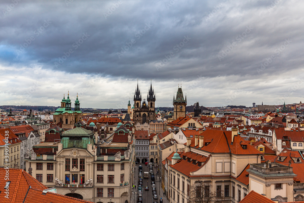 Aerial view of Prague old town and cityscape with church of Our Lady before Tyn on the Old Town Square on a cloudy day from top of Clementinum, Prague, Czech Republic