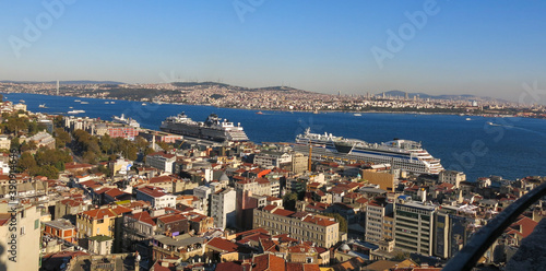 Ariel View of Istanbul which is Turkey's most populous city as well as its cultural and financial hub. Two huge cruise ships parked near Tophane, Karakoy port.