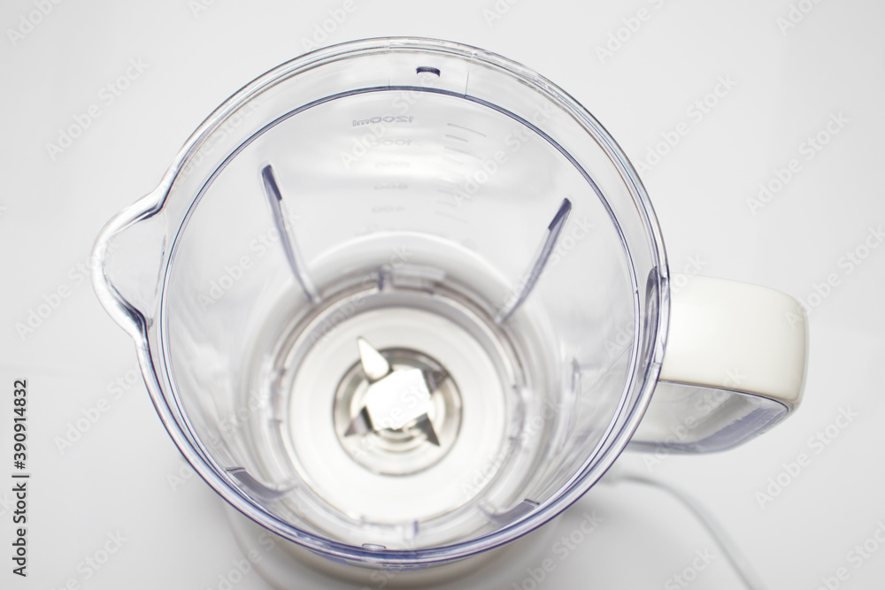 Plastic blender with steel knives, top view, selective focus. Milkshake Plastic blender with steel knives, top view, selective focus. Milkshake