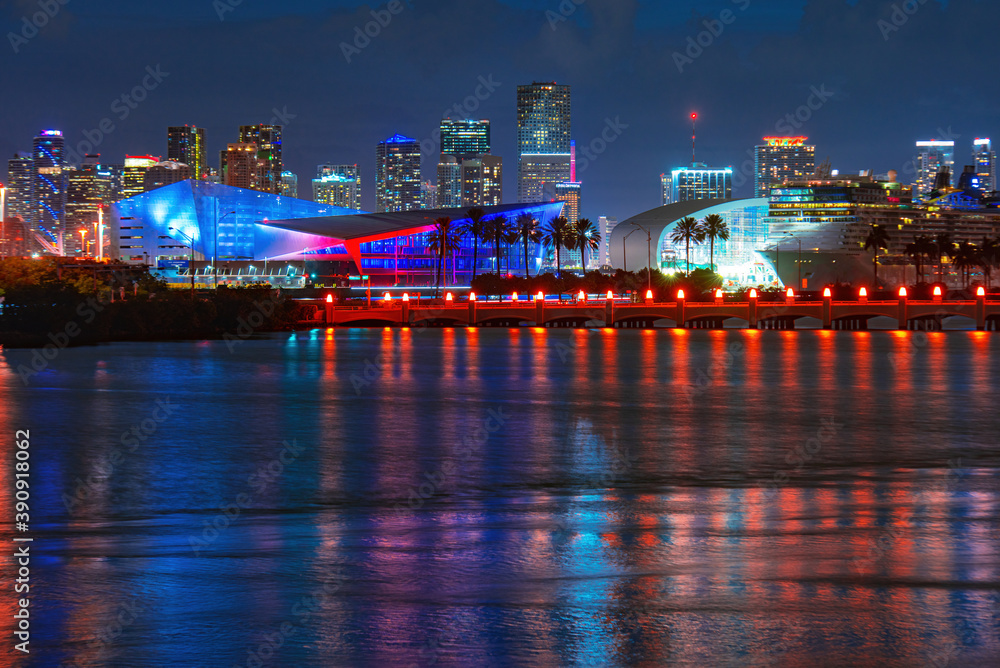 City of Miami, night panorama of downtown business skyscrapers. Miami, Florida, USA skyline on Biscayne Bay, city night backgrounds.