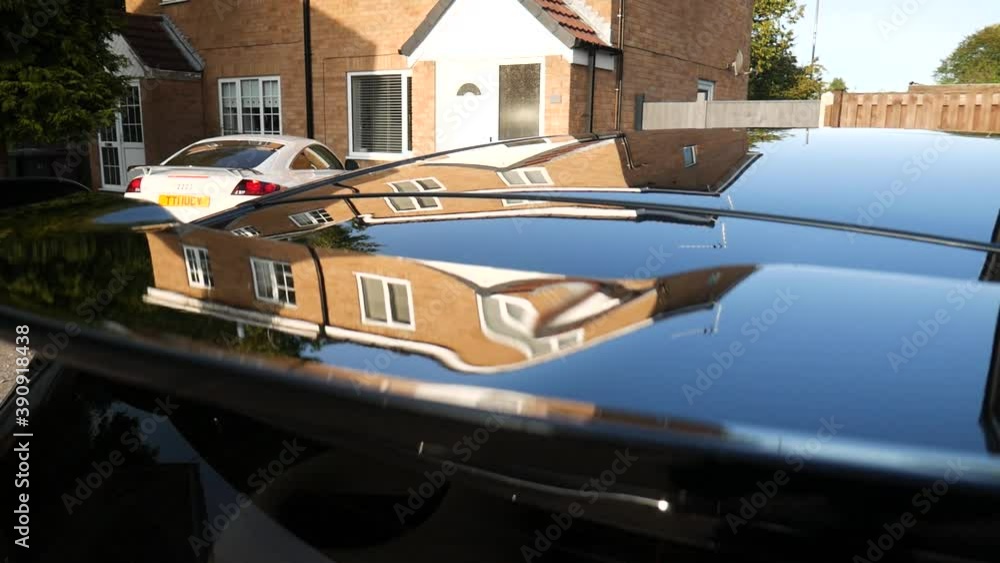 Glossy black car roof and spoiler Glossy black car roof and spoiler