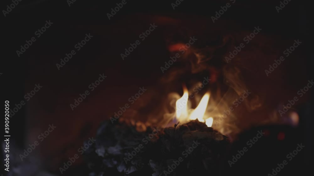 Small bit of fire burning in wood furnace Small bit of fire burning in wood furnace