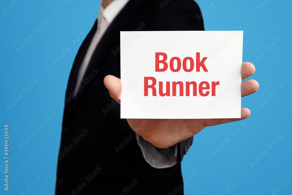 Book Runner. Businessman in suit showing business card with text. Man isolated on blue background Book Runner. Businessman in suit showing business card with text. Man isolated on blue background