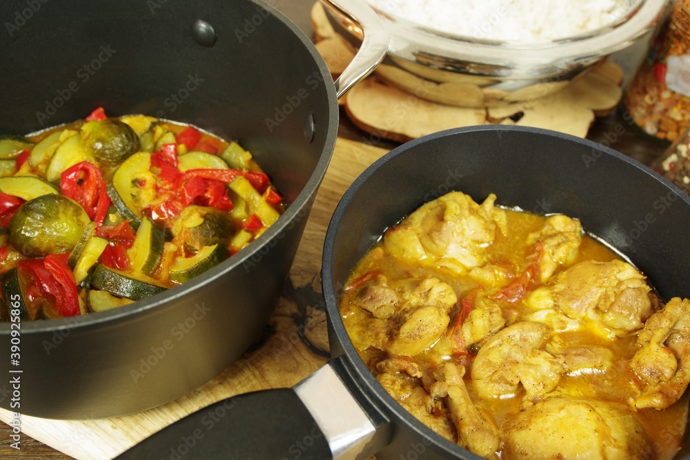 Homemade Chicken Curry with vegetables and Basmati Rice bowl. Closeup
