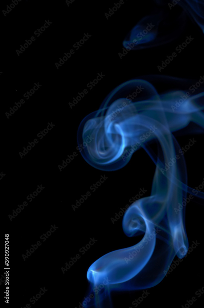Smoke streaming on a black background close-up Smoke streaming on a black background close-up