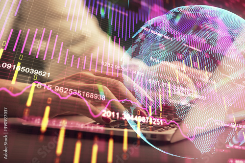 Double exposure of businesswoman hands typing on computer and forex chart hologram drawing. Financial analysis concept.