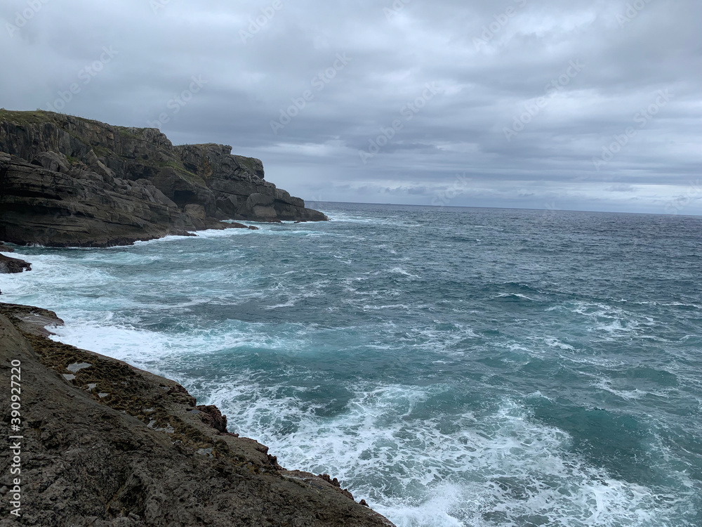 waves crashing on rocks