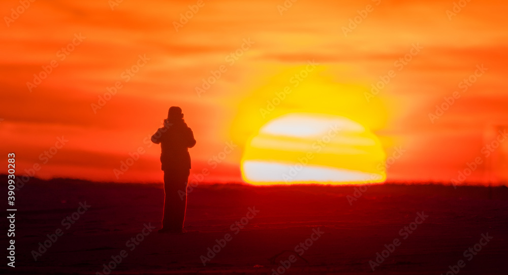 silhouette of a lady in sunset