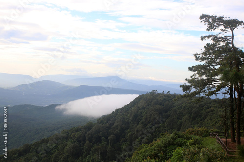 layers of mountains with fog