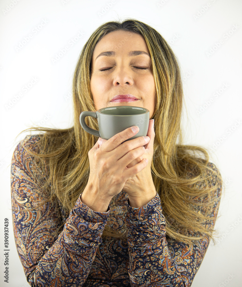 Beautiful Colombian woman showing love for her coffee Beautiful Colombian woman showing love for her coffee