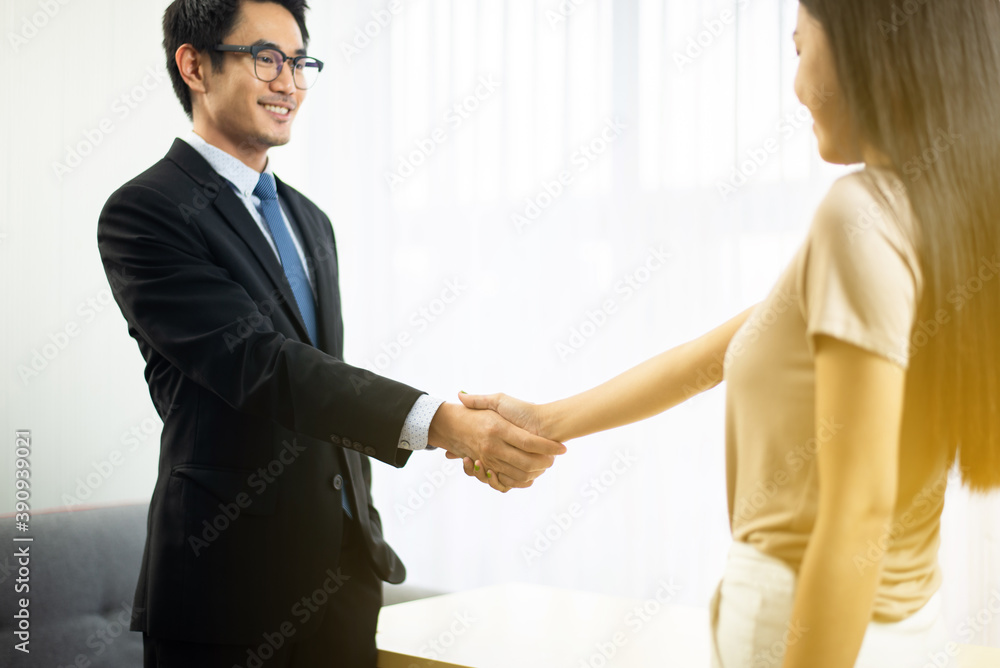 Business asian people shaking hands finishing up meeting,Happy partnership,Handshake for business deal Business asian people shaking hands finishing up meeting,Happy partnership,Handshake for business deal