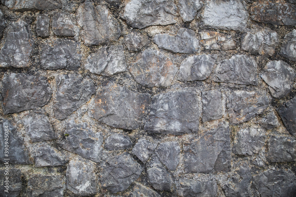 Old crumbling stone wall in an castle Old crumbling stone wall in an castle