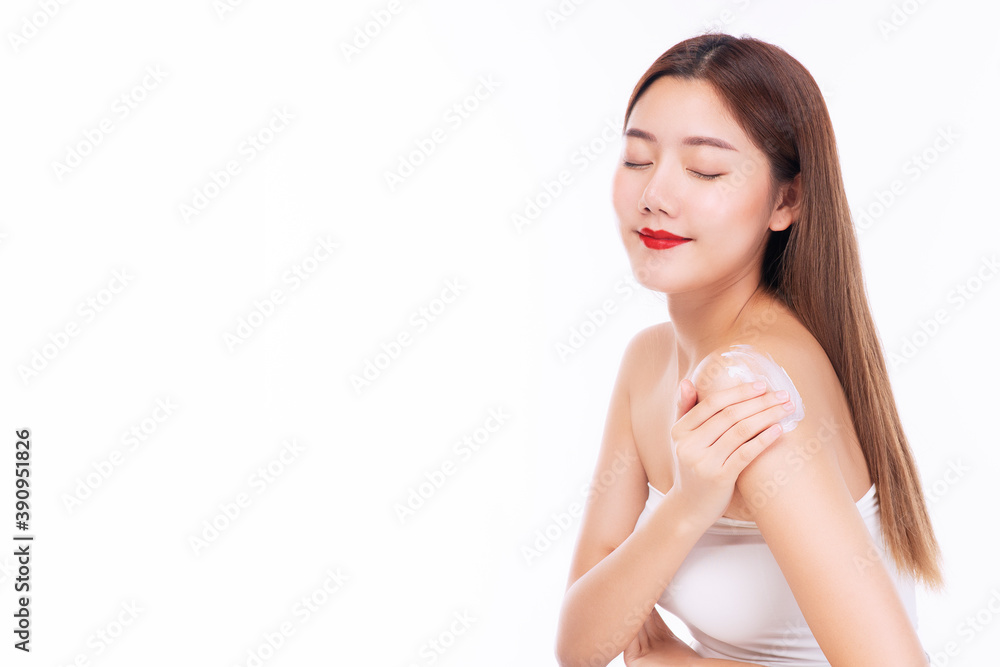 Portrait of smile young woman holding applying cosmetic cream or treatment moisturize in her body for skin care on isolated on white background. Healthy skin and cosmetics concept. Portrait of smile young woman holding applying cosmetic cream or treatment moisturize in her body for skin care on isolated on white background. Healthy skin and cosmetics concept.