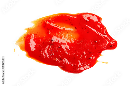 Drop of barbecue sauce or ketchup isolated on white background, top view, close up.