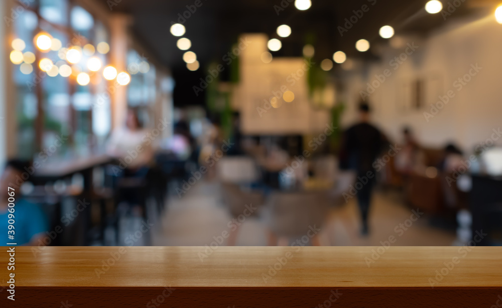 wooden table with  blurred cafe  restaurant