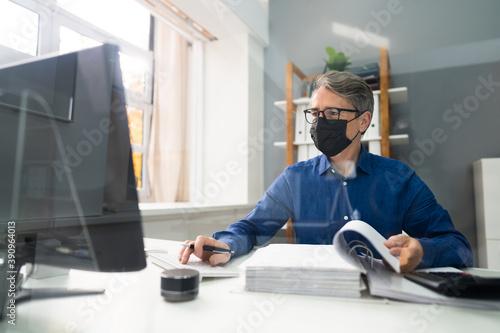 Senior Accountant Man Working With Invoice
