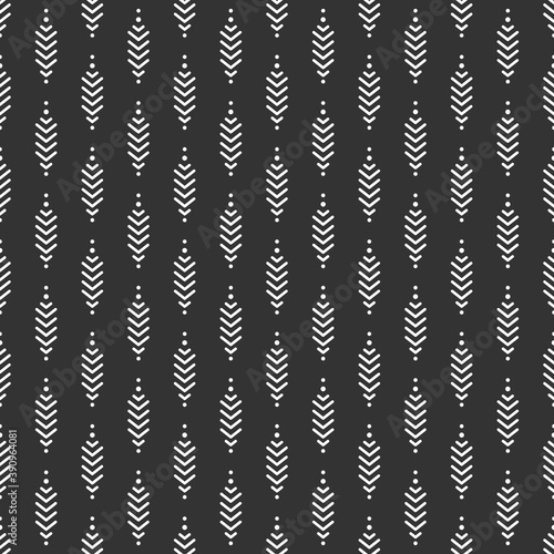Seamless pattern with white strokes and dots on black background.