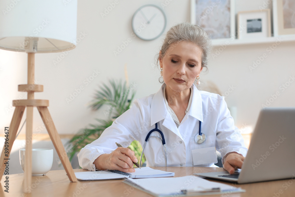 Middle aged female doctor therapist on consultation. Middle aged female doctor therapist on consultation.