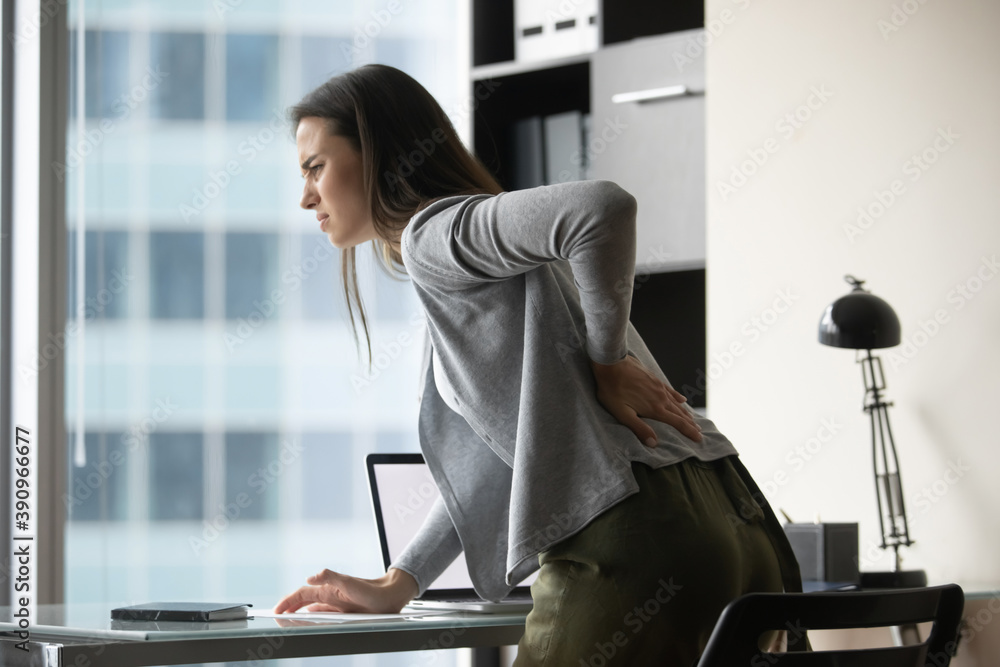 When office chair is Sad suffering millennial woman