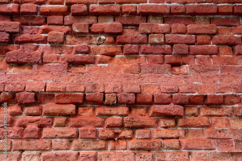 Fototapeta premium The brick background. Red brick background.