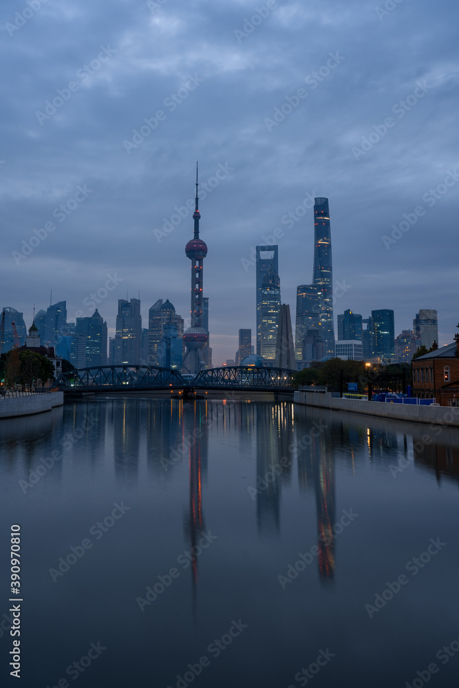 Sunrise view of Lujiazui, the financial district in Shanghai, China, on a cloudy day.