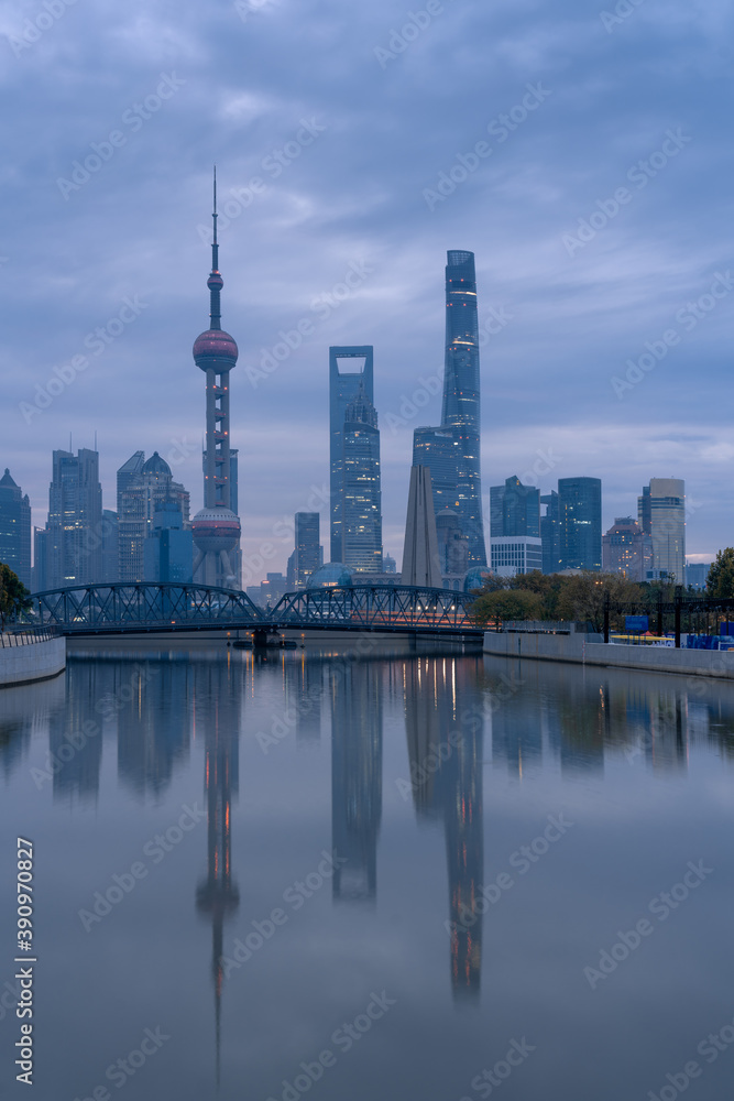 Sunrise view of Lujiazui, the financial district in Shanghai, China, on a cloudy day.