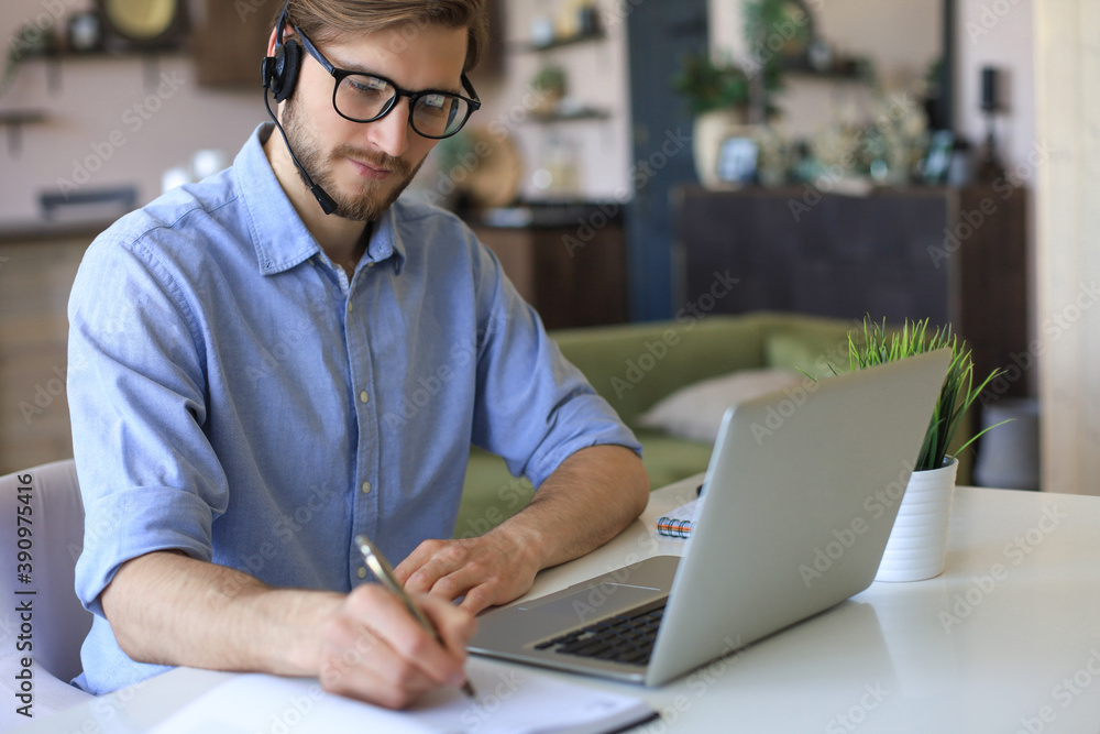 Freelance operator talking with headsets and consulting clients from home office. Freelance operator talking with headsets and consulting clients from home office.