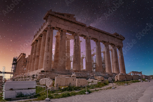 Parthenon ancient temple under dramatic starry sky, Athens Greece