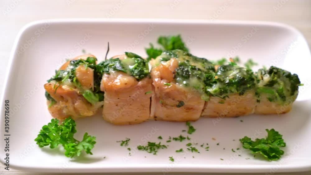 Chicken breasts stuffed with spinach and cheese on plate Chicken breasts stuffed with spinach and cheese on plate