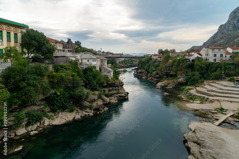 Old town of Mostar, Bosnia and Herzegovina, with Stari Most bridge, Neretva river and old mosques Old town of Mostar, Bosnia and Herzegovina, with Stari Most bridge, Neretva river and old mosques